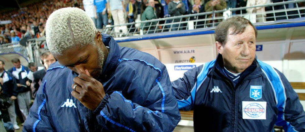 Djibril Cissé et Guy Roux, deux figures iconiques de l'AJ Auxerre.
