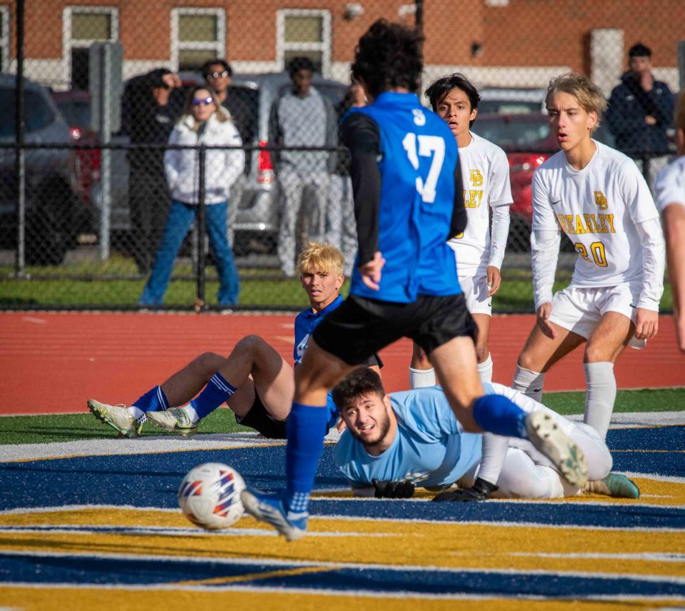 Shore Stephen Molnar scores the game-winning goal in OT as GK David Brearley can’t stop the kick at the boys' soccer Shore Regional vs Brearley in NJSIAA Group 1 championship game.