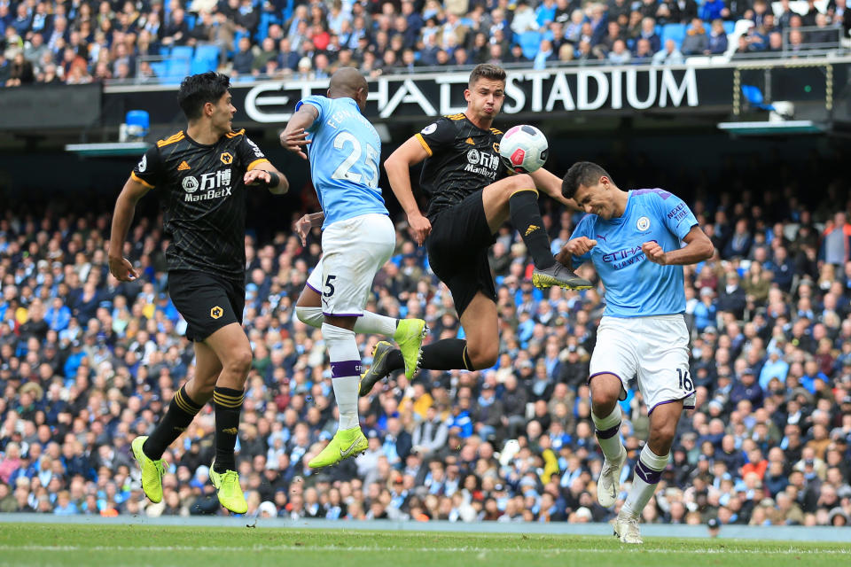 MANCHESTER, ENGLAND - OCTOBER 06: Leander Dendoncker of Wolves battles with Rodri of Man City during the Premier League match between Manchester City and Wolverhampton Wanderers at the Etihad Stadium on October 6, 2019 in Manchester, United Kingdom. (Photo by Simon Stacpoole/Offside/Offside via Getty Images)