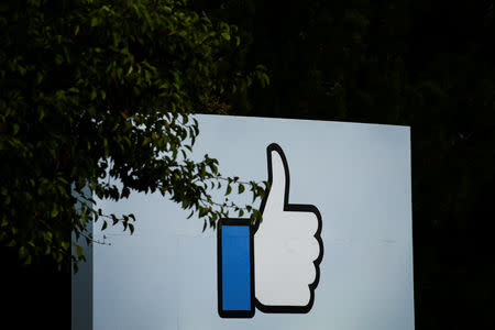 FILE PHOTO: The entrance sign to Facebook headquarters is seen in Menlo Park, California, October 10, 2018. REUTERS/Elijah Nouvelage/File Photo