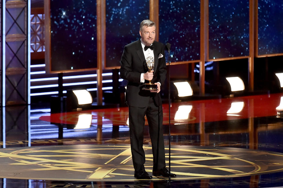 Charlie Brooker accepts the Outstanding Writing for a Limited Series, Movie, or Dramatic Special award at&nbsp;the 69th Annual Primetime Emmy Awards. (Photo: Jeff Kravitz via Getty Images)