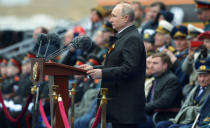 Russian President Vladimir Putin delivers his speech during the Victory Day military parade in Moscow, Russia, Sunday, May 9, 2021, marking the 76th anniversary of the end of World War II in Europe. (Alexei Nikolsky, Sputnik, Kremlin Pool Photo via AP)