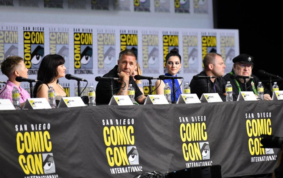 Considine and Carey (3rd and 4th L), with the House of the Dragon cast at a panel during Comic-Con International in San Diego, California in July (AFP via Getty Images)