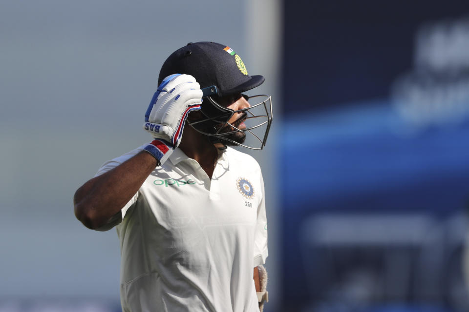 India's Murali Vijay walks off after being dismissed during play in the second cricket test between Australia and India in Perth, Australia, Monday, Dec. 17, 2018. (AP Photo/Trevor Collens)