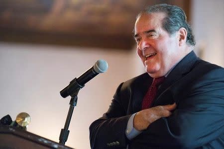 U.S. Supreme Court Justice Antonin Scalia speaks at an event sponsored by the Federalist Society at the New York Athletic Club in New York, U.S. on October 13, 2014. REUTERS/Darren Ornitz/File Photo