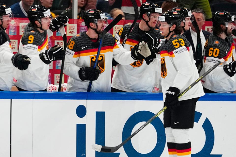Germany's Moritz Seider celebrates after scoring a goal against Hungary at the ice hockey world championship in Tampere, Finland, Sunday, May 21, 2023.