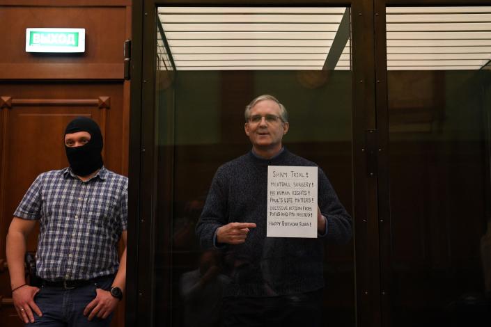 Paul Whelan stands inside a defendants&#39; cage as he waits to hear his verdict in Moscow on June 15, 2020.