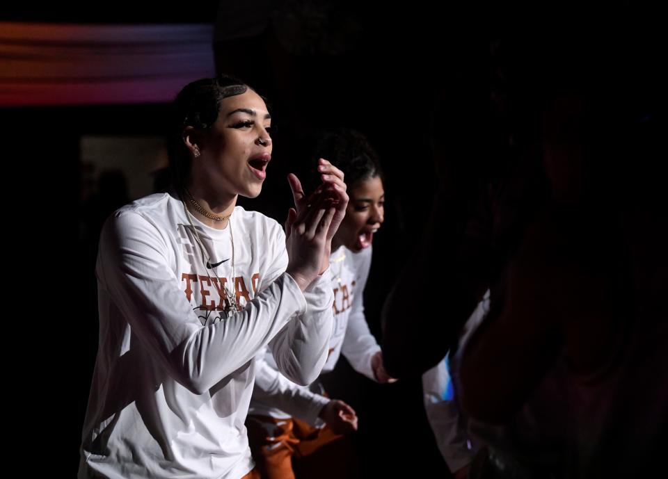 Texas guard Jordana Codio claps before the game against Kansas State in the Big 12 tournament last March at Municipal Auditorium in Kansas City, Mo. Codio was rehabbing a knee injury during the entire 2022-23 season.