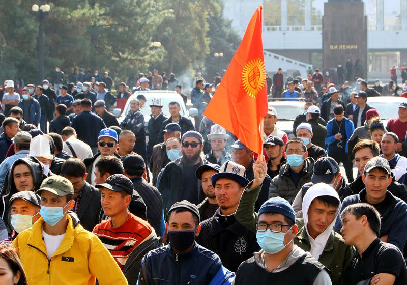 People attend a rally to demand the resignation of Kyrgyzstan's President Sooronbai Jeenbekov in Biskek