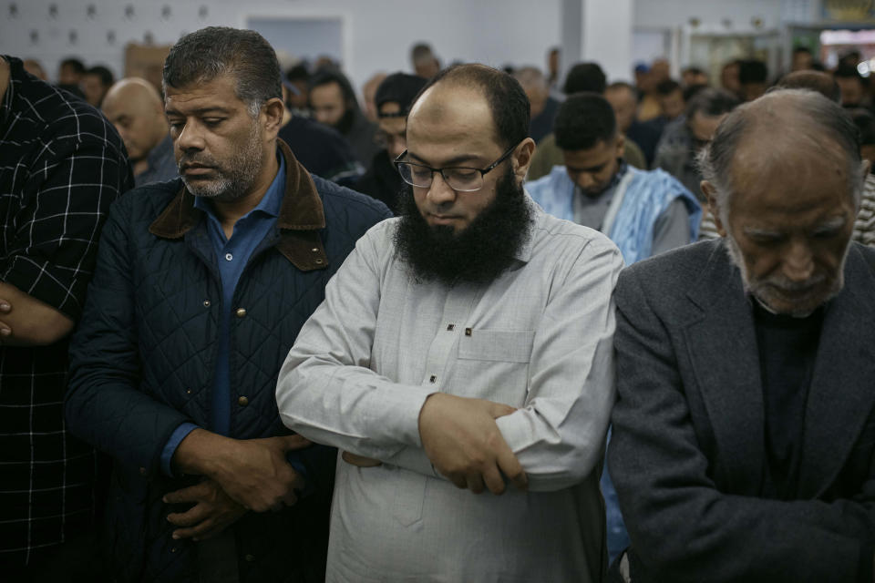 People pray during a service at the Islamic Society of Bay Ridge mosque on Friday, Oct. 13, 2023, in the Brooklyn borough of New York. In Muslim communities across the world, worshippers gathered at mosques for their first Friday prayers since Hamas militants attacked Israel, igniting the latest Israel-Palestinian war. (AP Photo/Andres Kudacki)