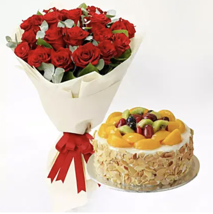 Red roses and fruit cake.  (PHOTO: Ferns N Petals)