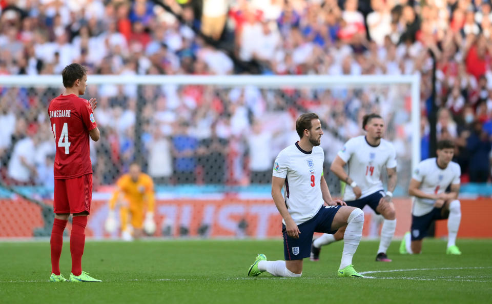 Soccer Football - Euro 2020 - Semi Final - England v Denmark - Wembley Stadium, London, Britain - July 7, 2021 England players take the knee before the match Pool via REUTERS/Laurence Griffiths