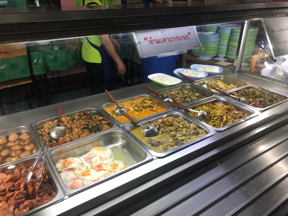 Selection of food under glass in Thailand