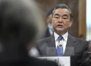 Chinese Foreign Minister Wang Yi talks with South Korean Foreign Minister Kang Kyung-wha during their meeting at the foreign ministry in Seoul, South Korea, Thursday, Nov. 26, 2020. Wang arrived in Seoul on Nov. 25, for a three-day state visit.(Kim Min-hee/Pool Photo via AP)