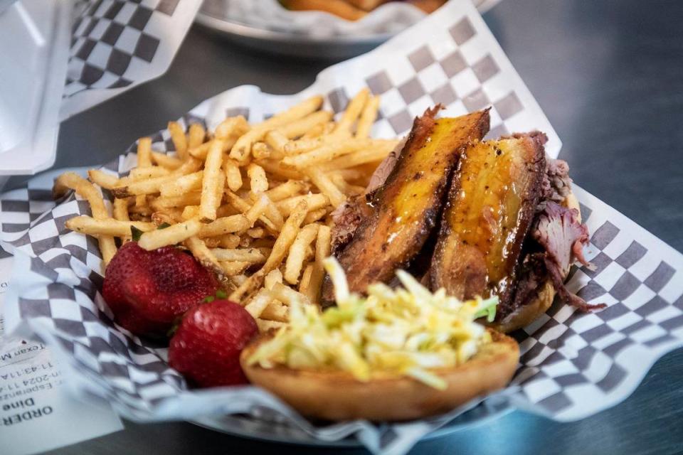 A Fifty-Fifty sandwich with a side of fries is prepared for a customer at the Tri-Tipery restaurant, located at 11359 Newport Road, in Ballico, Calif., on Thursday, June 13, 2024.