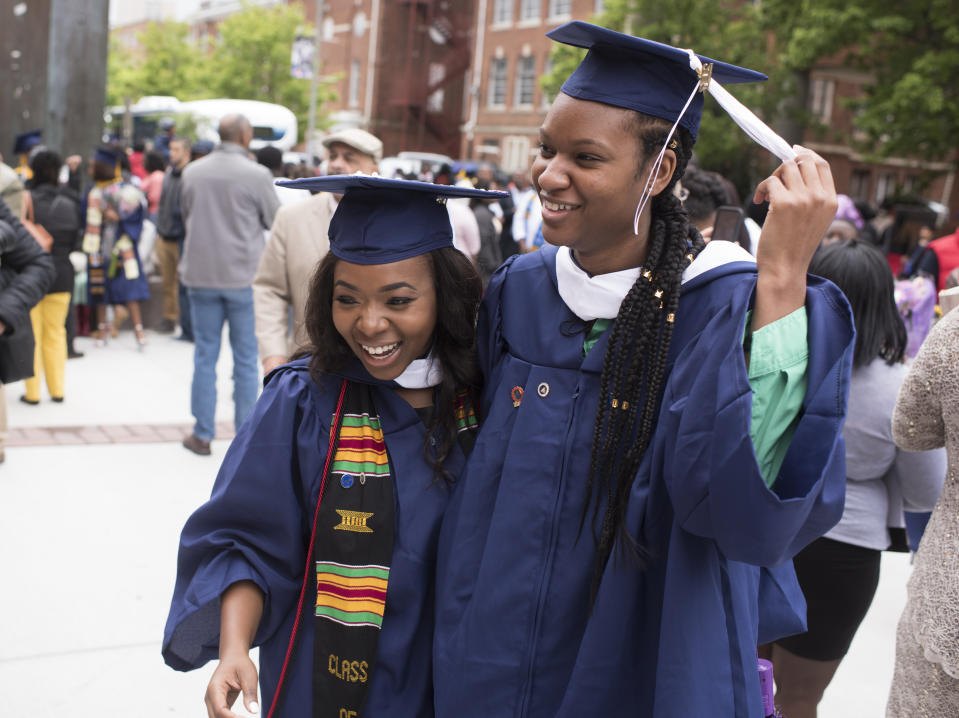 WASHINGTON DC - MAY 13:
Angel C. Dye (left) celebrating the day with her best friend Renee Walter after   The 2017 Howard University Commencement Ceremony in Washington, DC on May, 13, 2017.
In 2016, Angel Dye was trying to pursue her Howard University education, but like scores of other students at the prominent, financially strapped HBCU, she owed thousands, and had been kicked out of her dorm room and still took classes on the down low. A year later Dye receives her degree today,  with the help of donors who read her story  and is headed to graduate school. 
 (Photo by Marvin Joseph/The Washington Post via Getty Images)