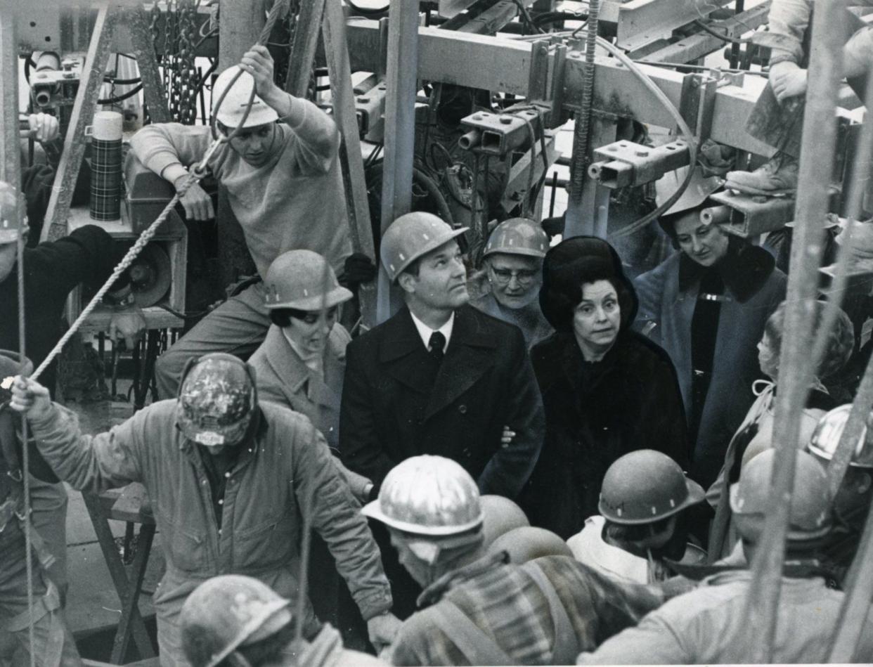 The Rev. Rex Humbard and his wife, Maude Aimee, visit the top of the work platform 490 feet up at the Cathedral Tower in November 1971.