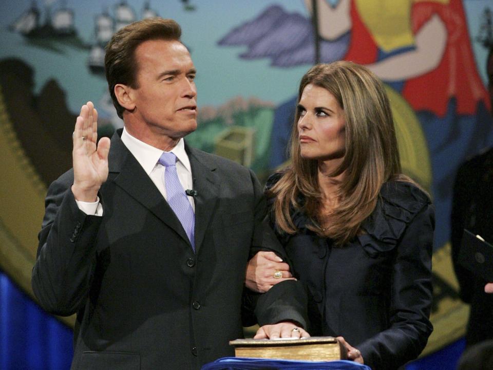 California governor Arnold Schwarzenegger is sworn in for second term as his wife Maria Shriver looks on January 5, 2007 in Sacramento, California.