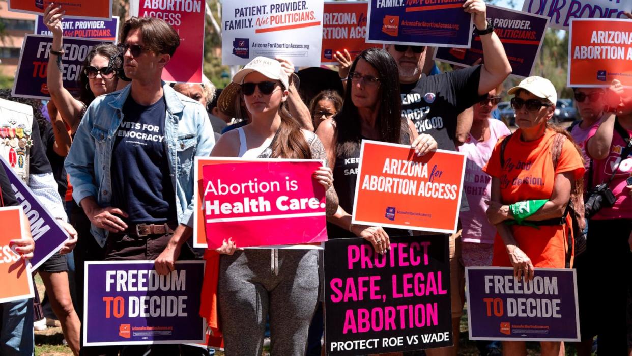 PHOTO: Members of Arizona for Abortion Access, the ballot initiative to enshrine abortion rights in the Arizona State Constitution, hold a protest condemning Arizona House Republicans and the 1864 abortion ban in Phoenix, AZ, April 17, 2024. (Rebecca Noble/Getty Images)