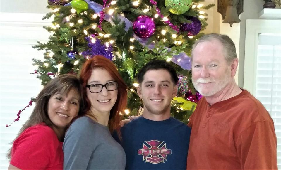 This 2015 image provided by the Reed family shows Trevor Reed, second from right, with his family from left, mother Paula Reed, sister Taylor Reed and father Joey Reed. Russia is holding Marine veteran Trevor Reed, who was sentenced to nine years on charges he assaulted a police officer. (Reed Family via AP)