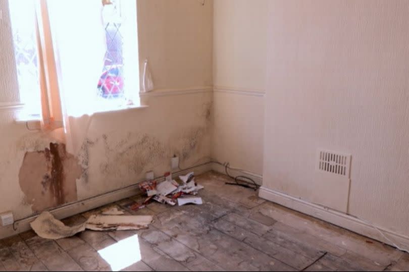 The front living room before refurbishment -Credit:BBC