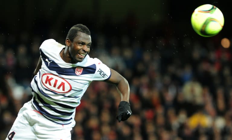 Bordeaux's forward Cheick Diabate heads the ball during the French L1 football match against Guingamp on February 13, 2016