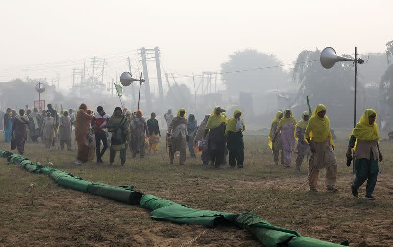 Farmers gather to mark the first anniversary of their protests on the outskirts of Delhi at Pakora Chowk near Tikri border