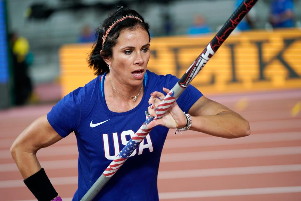 Jenn Suhr, of the United States, warms up at the World Athletics Championships in Doha, Qatar, Sunday, Sept. 29, 2019. Suhr was training to compete in the Tokyo Olympics before the coronavirus pandemic struck.