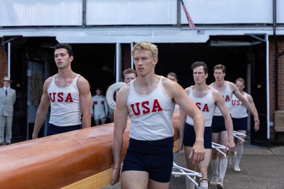 Bruce Herbelin-Earle stars as Shorty Hunt, Callum Turner as Joe Rantz, and Wil Coban as Jim McMillan in director George Clooney's The Boys In The Boat. (MGM/Warner Bros.)