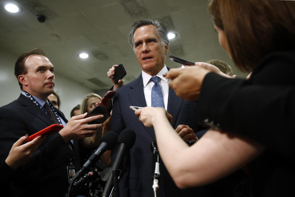 FILE - In this May 21, 2019 file photo, Sen. Mitt Romney, R-Utah, speaks to reporters after a classified members-only briefing on Iran, Capitol Hill in Washington. Romney’s ratcheted-up rhetoric on President Donald Trump is again raising hopes among Trump detractors that the senator could play a key role in the unfolding impeachment saga, though the historic shifts in their relationship mean Romney’s next move is an open question. (AP Photo/Patrick Semansky, File)