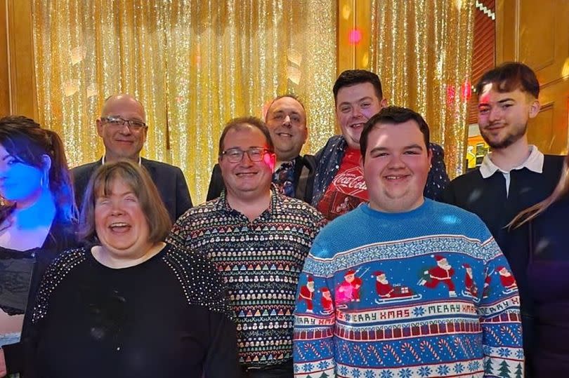 Mikelle Hardy Ingham at a Christmas party with Palm Torbay colleagues