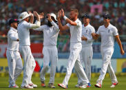 Cricket - India v England - Second Test cricket match - Dr. Y.S. Rajasekhara Reddy ACA-VDCA Cricket Stadium, Visakhapatnam, India - 17/11/16. England's Stuart Broad (3rd R) celebrates with team mates after taking the wicket of India's Lokesh Rahul. REUTERS/Danish Siddiqui