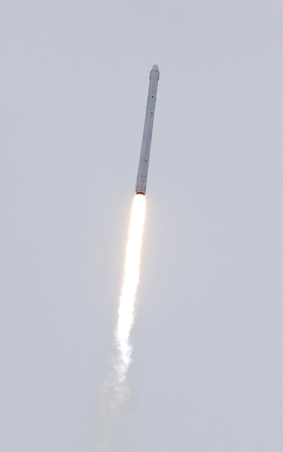 A rocket carrying the SpaceX Dragon ship lifts off from launch complex 40 at the Cape Canaveral Air Force Station in Cape Canaveral, Fla. on Friday, April 18, 2014. The mission will deliver research equipment, food and other supplies to the International Space Station. (AP Photo/John Raoux)