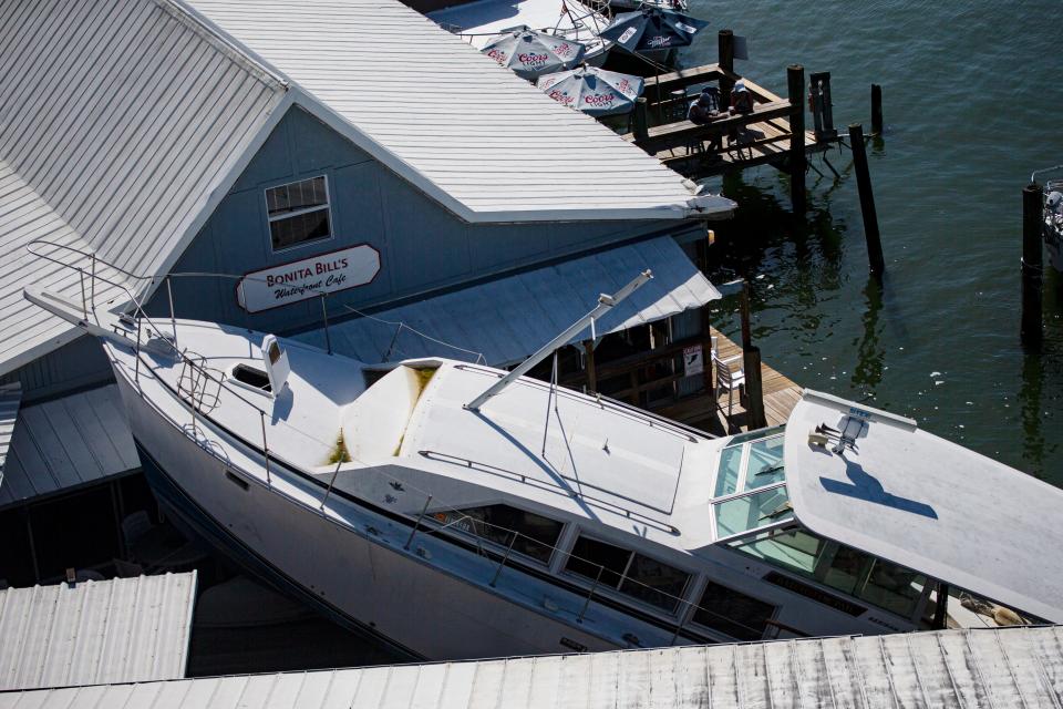 A boat that broke loose from the docks at Bonita Bill's on Fort Myers Beach got lodged on the dock when Hurricane Ian hit Southwest Florida in September 2022. Almost eight months later, the boat has yet to be removed. It has become quite the attraction for local residents and tourists. It is unknown when the boat will be removed but the owners of the popular restaurant are hoping sooner than later.