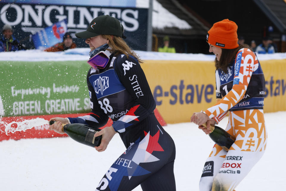 Slovakia's Petra Vlhova, winner of an alpine ski, women's World Cup slalom race, right, celebrates with third-placed United States' A.J. Hurt, in Kranjska Gora, Slovenia, Sunday, Jan. 7, 2024. (AP Photo/Giovanni Maria Pizzato)