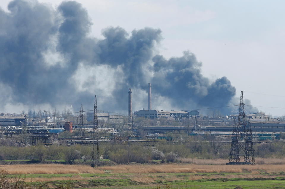 Smoke rises above a plant of Azovstal Iron and Steel Works company during Ukraine-Russia conflict in the southern port city of Mariupol, Ukraine April 20, 2022. 