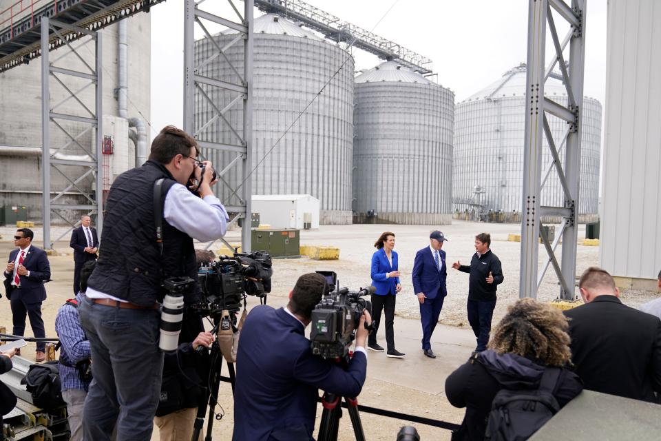 Jack Mitchell, regional vice president of POET Bioprocessing, right, gives President Joe Biden and Rep. Cindy Axne, D-Iowa, a tour of the facility in Menlo, Iowa, on April 12.