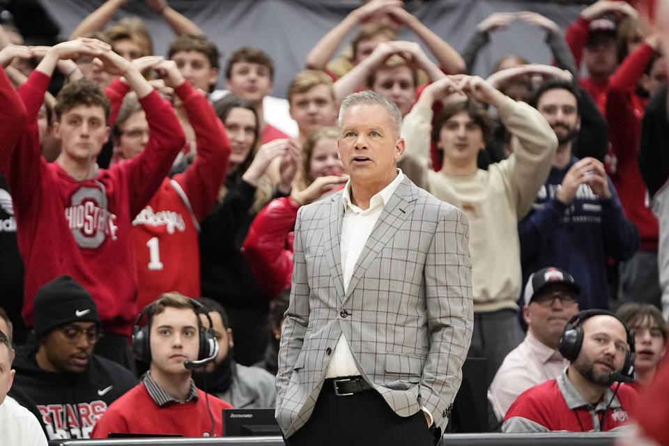 Jan 10, 2024; Columbus, Ohio, USA; Ohio State Buckeyes head coach Chris Holtmann watches his team shoot free throws during the second half of the NCAA men’s basketball game against the Wisconsin Badgers at Value City Arena. Ohio State lost 71-60.