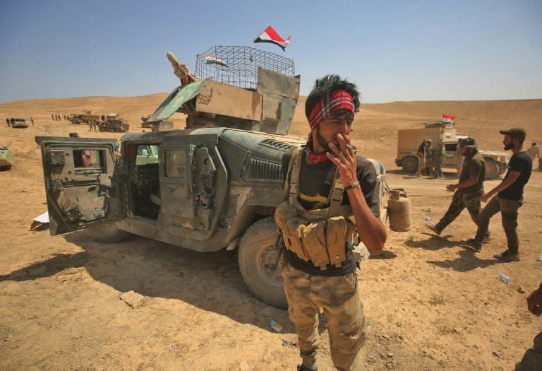 Shiite fighters advance towards the Iraqi city of Tal Afar, the main remaining stronghold of the Islamic State group, on August 21, 2017