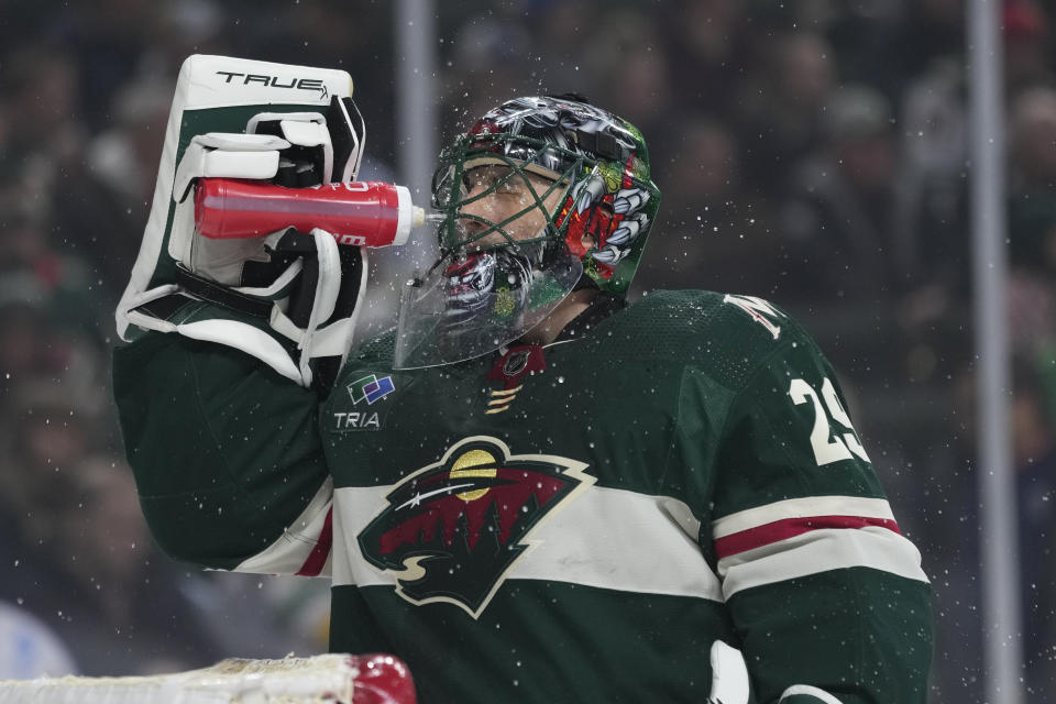 Minnesota Wild goaltender Marc-Andre Fleury douses his face with water during the first period of the team's NHL hockey game against the Tampa Bay Lightning, Thursday, Jan. 4, 2024, in St. Paul, Minn. (AP Photo/Abbie Parr)