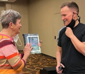 Margo Euler, founder/director of The Unicorn Singers and the Broad Cove Chorale, meets Craig Hella Johnson, the composer of the contemporary choral oratorio "Considering Matthew Shepard," at a music conference in Boston in February. On April 9 and 10, the Broad Cove Chorale and The Unicorn Singers will present this work as their annual spring program in Norwell.