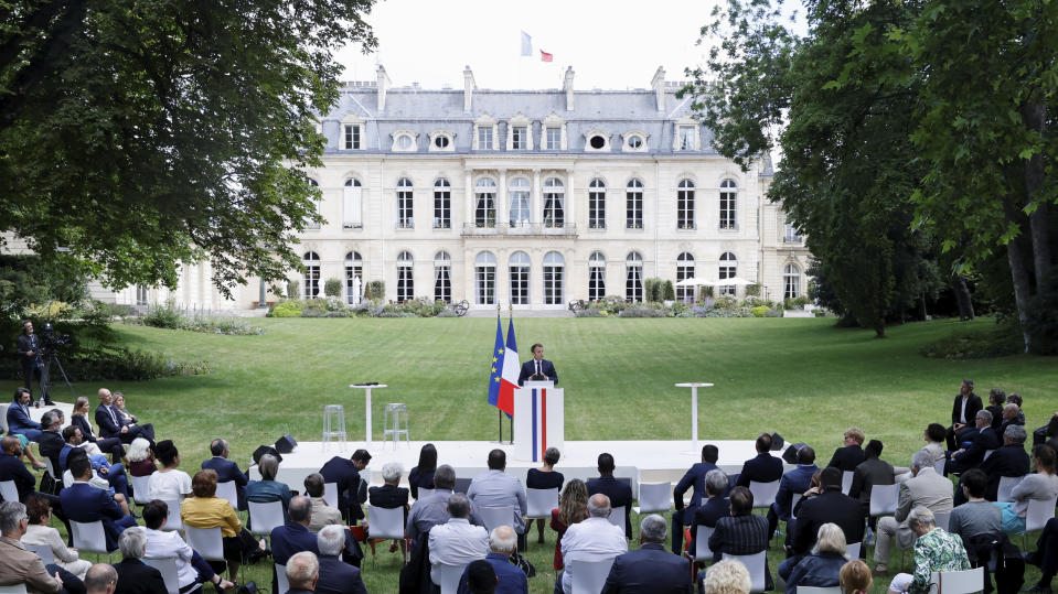 French President Emmanuel Macron delivers his speech during a meeting with members of the Citizens' Convention on Climate to discuss over environment proposals at the Elysee Palace in Paris, Monday, June 29, 2020. French President Emmanuel Macron, who once declared "Make The Planet Great Again" but whose climate agenda got knocked off course by persistent street protests, is under new pressure to fight climate change after the Green Party did well in Sunday's local elections. (Christian Hartmann/Pool via AP)