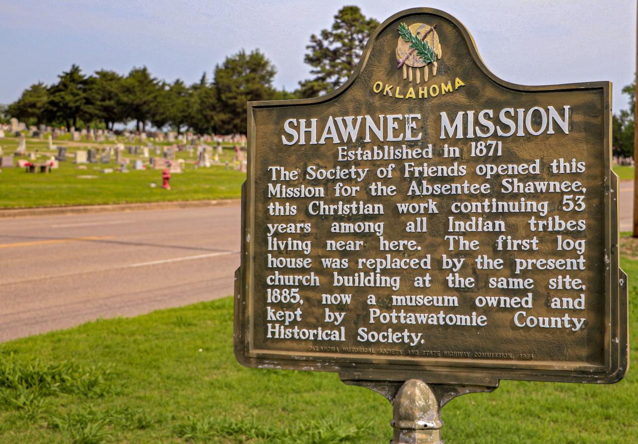 A historical marker from 1964 seen Wednesday near the Shawnee Friends Mission explains its historical significance.