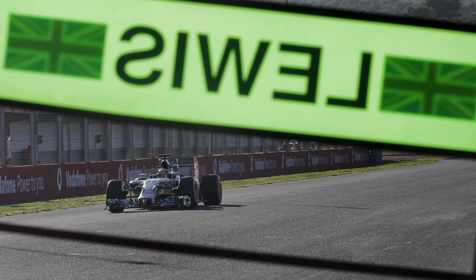 Lewis Hamilton of Great Britain and Mercedes GP drives during the 2014 Formula One Testing at the Circuito de Jerez on Thursday, Jan. 30, 2014, in Jerez de la Frontera, Spain. (AP Photo/Miguel Angel Morenatti)