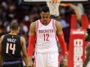 Apr 7, 2016; Houston, TX, USA; Houston Rockets center Dwight Howard (12) reacts after a play in the first half against the Phoenix Suns at Toyota Center. The Suns won 124-115. Mandatory Credit: Troy Taormina-USA TODAY Sports