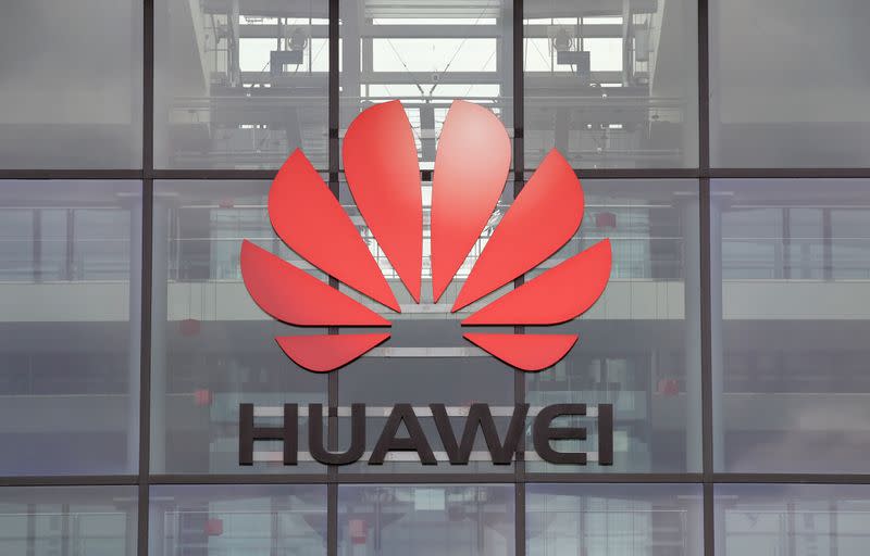 Huawei logo is pictured on the headquarters building in Reading