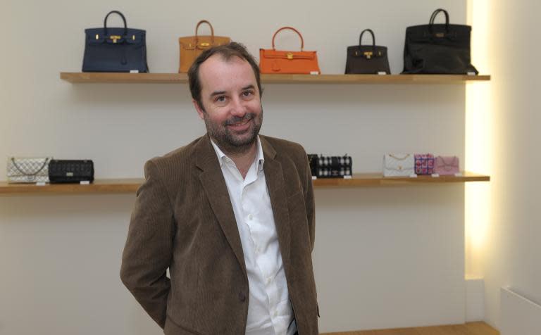 Collector Square co-founder and Managing Director Loic Bocher poses at the showroom in Paris on April 30, 2015