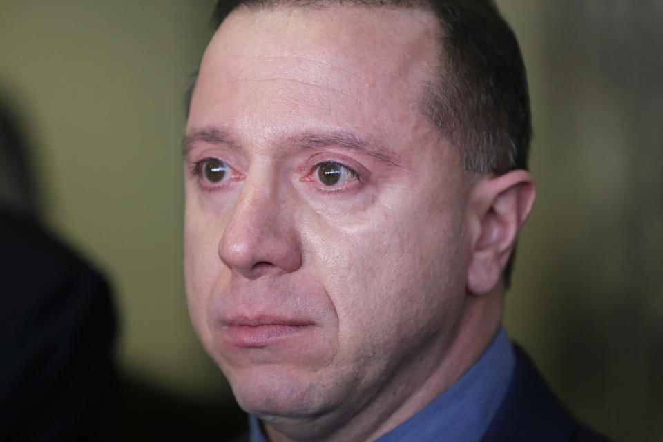 FILE - Johnny Hincapie becomes emotional as he speaks to reporters after leaving the courtroom in New York, Jan. 25, 2017. Attorneys for Hincapie confirmed Friday, Dec. 2, 2022, that Hincapie, a man who was freed in 2015 after spending a quarter-century in prison for an infamous tourist killing, will receive nearly $18 million in legal settlements from the city and state of New York. (AP Photo/Seth Wenig, File)