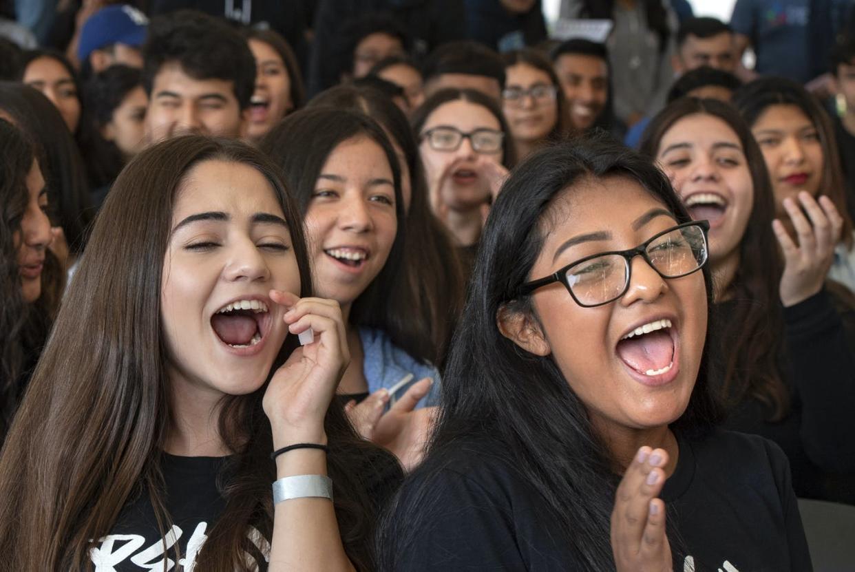 <span class="caption">A majority of Americans – including people of color – live in suburbs.</span> <span class="attribution"><a class="link " href="https://www.gettyimages.com/detail/news-photo/students-get-pumped-up-during-the-power-california-early-news-photo/1058953822?adppopup=true" rel="nofollow noopener" target="_blank" data-ylk="slk:Mindy Schauer/Digital First Media/Orange County Register via Getty Images;elm:context_link;itc:0;sec:content-canvas">Mindy Schauer/Digital First Media/Orange County Register via Getty Images</a></span>