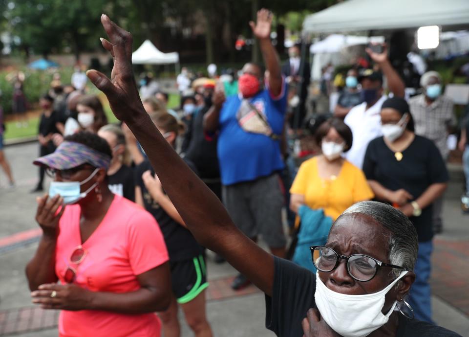 <p>Mourners gathered outside Atlanta's Ebenezer Baptist Church during the funeral service for Representative John Lewis. Lewis represented the 5th district, which includes most of Atlanta, for over three decades. </p>